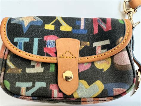 dooney and bourke wristet real or fake|dooney and bourke wristlet wallet.